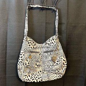 Kathy Van Zeeland snow leopard purse